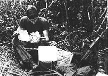 Photo of a soldier in Korea opening mail.